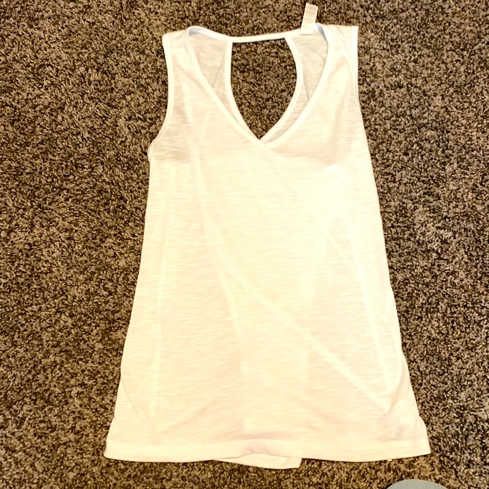 Marika sleeveless v neck.  No flaws.